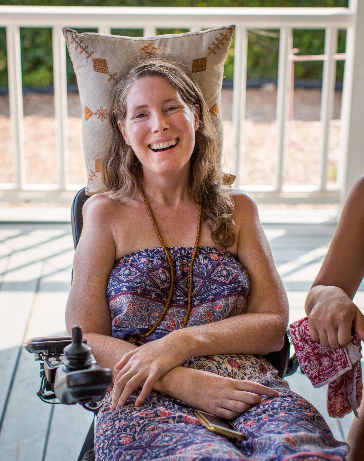 Betsy Davis smiles July 24, 2016, during a two-day going away party with her family and friends in Ojai, Calif. In early July, Davis emailed her closest friends and family to invite them to a two-day celebration, telling them: “These circumstances are unlike any party you have attended before, requiring emotional stamina, centeredness, and openness. And one rule: No crying.” Davis, diagnosed with ALS, held the party to say goodbye before becoming one of the first California residents to take life-ending drugs under a new law that gave such an option to the terminally ill. (Niels Alpert / Associated Press)