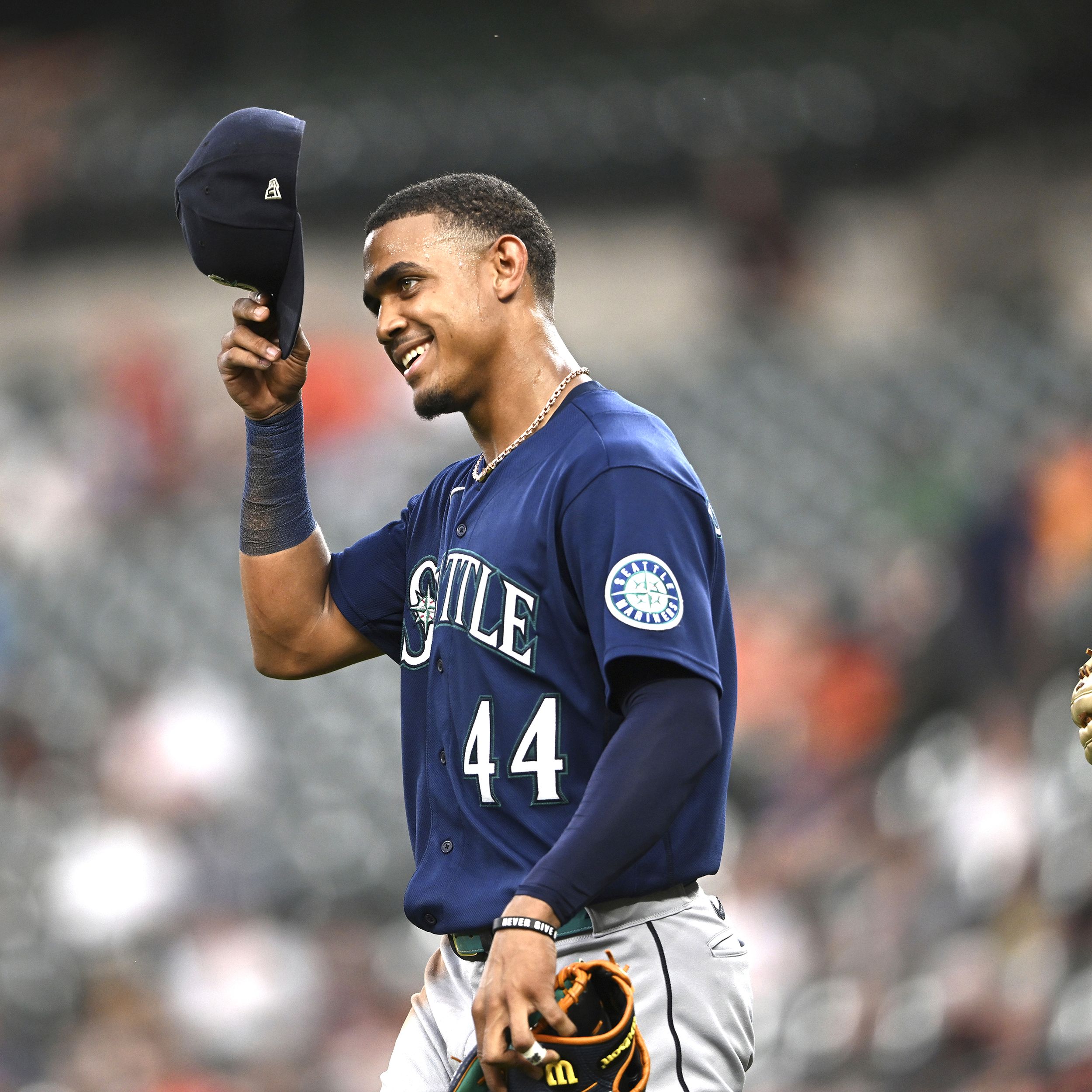 American League's Julio Rodriguez, of the Seattle Mariners, smiles