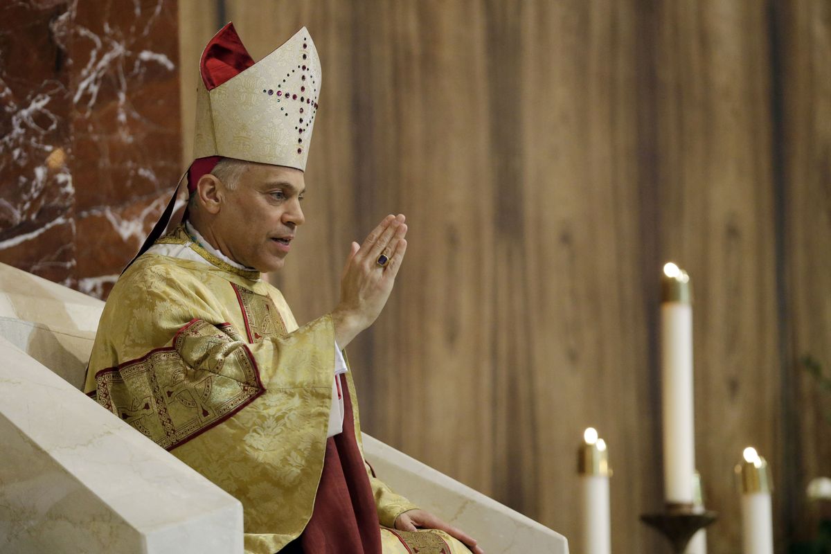 Salvatore J. Cordileone gives a blessing sing during a ceremony to install him as the new archbishop of San Francisco at the Cathedral of St. Mary of the Assumption in San Francisco,  Thursday,  Oct. 4, 2012. (Marcio Sanchez / Pool Ap)