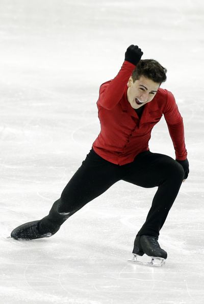 Max Aaron celebrates after finishing his free skate program at the U.S. Figure Skating Championships. His stellar performance in the free skate boosted him from fourth place to first. (Associated Press)