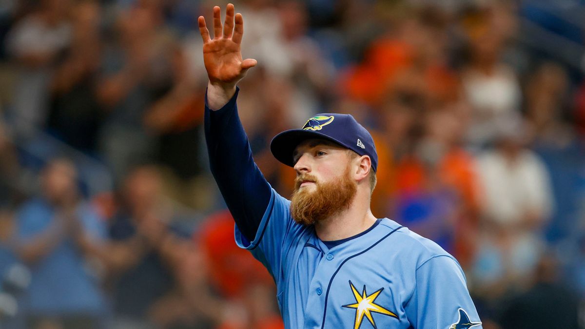Tampa Bay Rays starter Drew Rasmussen waves to the fans after leaving the game in the ninth inning Sunday against the Baltimore Orioles.  (Tampa Bay Times)