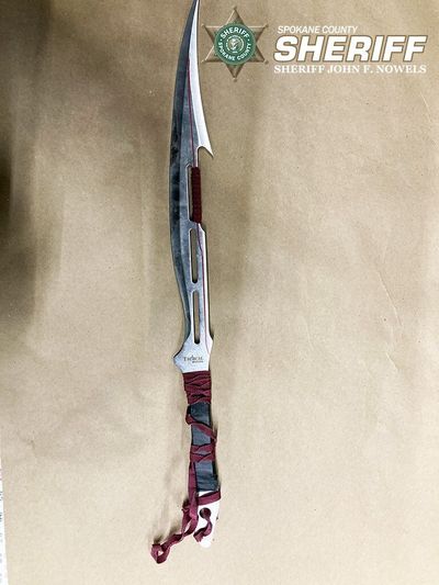 This knife/sword was reportedly used in a fight that left two people wounded and two others in handcuffs Friday night in Spokane Valley.  (Courtesy of Spokane County Sheriff's Office)