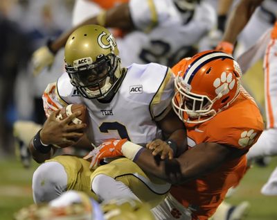 Clemson corralled QB Vad Lee, left, and the ACC-leading Georgia Tech running game, allowing 72 yards in the first half. (Associated Press)