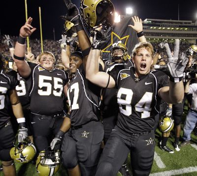 Vanderbilt players display their school spirit after defeating Auburn 14-13 in Saturday’s Southeastern Conference play.  (Associated Press / The Spokesman-Review)