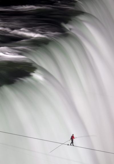 Nik Wallenda walks over Niagara Falls on a tightrope on Friday. (Associated Press)
