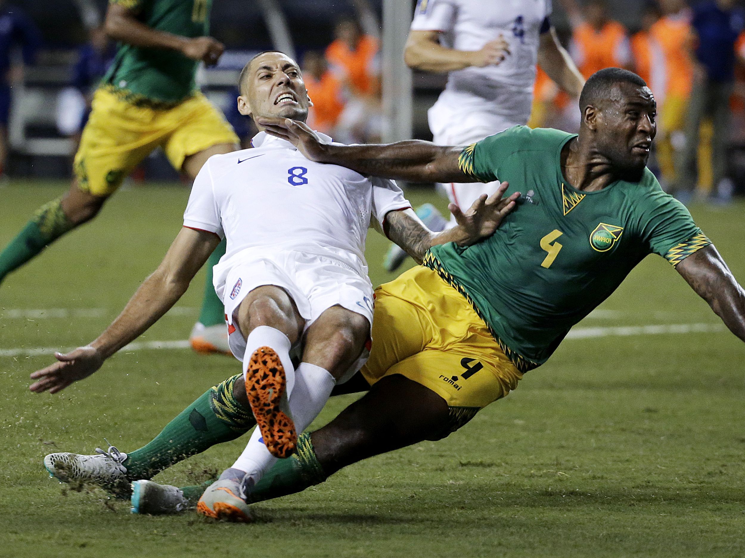 Clint Dempsey Makes Face at Jamaican Player