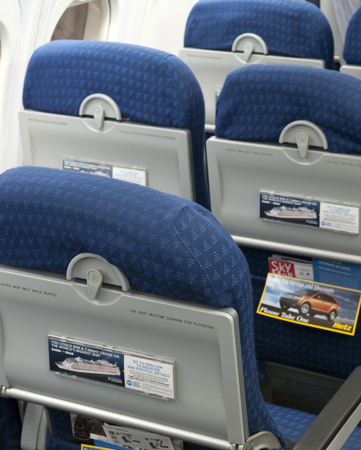 In this undated photo provided by AirTran, advertisements are seen on the on the bottoms of seat-back tray tables. AirTran expects the ads to be on its 138 planes within weeks. Associated Press photos (Associated Press photos)