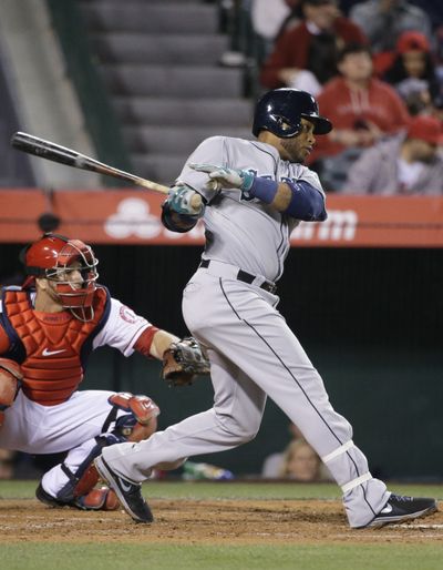 Robinson Cano drives in his first run as a Mariner, in the third inning Wednesday. (Associated Press)