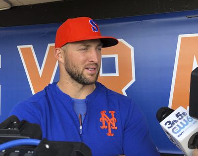 Syracuse Mets’ Tim Tebow speaks with reporters prior to a minor league baseball game, Thursday, May 16, 2019 in Syracuse, N.Y. The former Heisman Trophy-winner and NFL quarterback is struggling with the Syracuse Mets but has begun to come alive at the plate with hits in five of the last six games. (John Kekis / Associated Press)