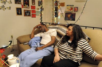 Fred Watley, tired from his recovery from a liver transplant, can hardly keep his eyes open while sitting with his wife, LiAnne Watley, in their North Side home  in Spokane last week. “Mostly I’m feeling pretty good,” he said recently.   (Jesse Tinsley / The Spokesman-Review)