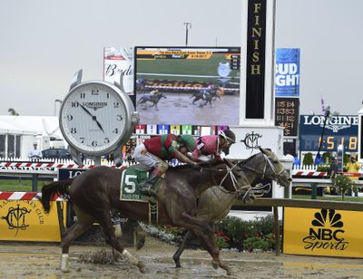 Actress on the inside rail with Nik Juarez atop wins the Black-Eyed Susan horse race at Pimlico race course as Lights of Medina with Feargal Lynch aboard take second place, Friday, May 19, 2017, in Baltimore. The 142nd Preakness Stakes horse race runs Saturday. (Mike Stewart / Associated Press)