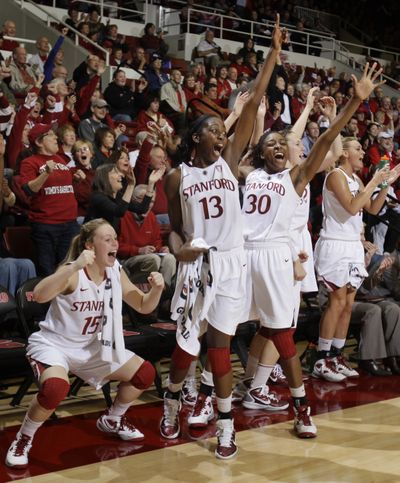 Stanford players celebrate in the final seconds against Xavier.  (Associated Press)