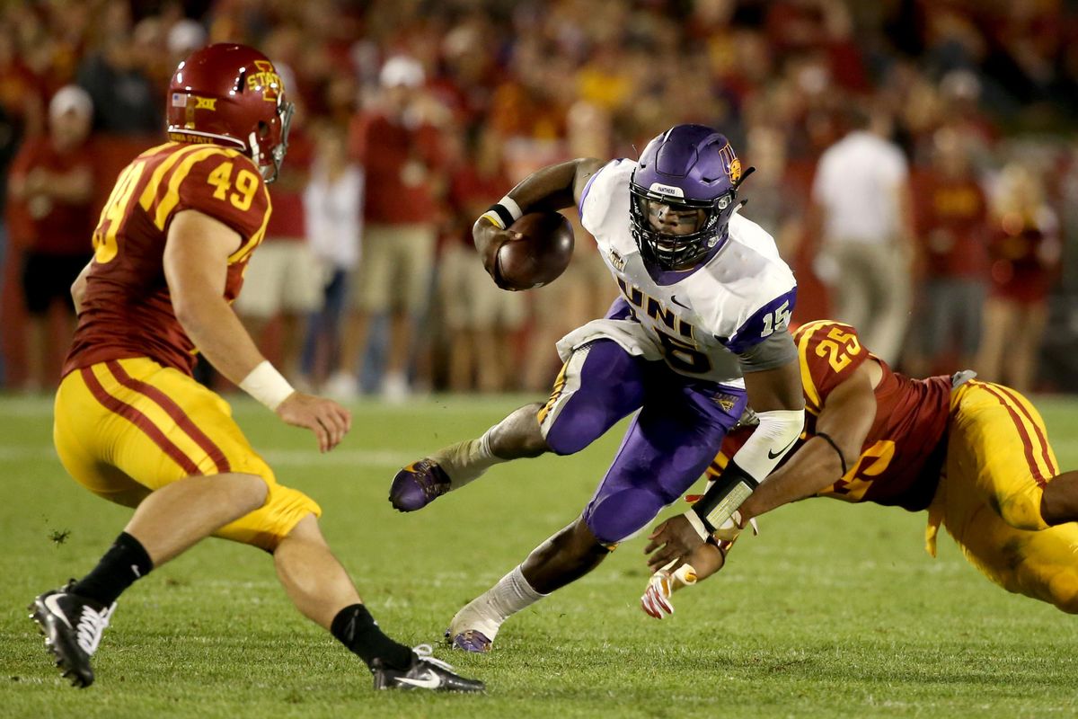 Northern Iowa quarterback Aaron Bailey gets past a diving Iowa State linebacker during the Panthers’ 25-20 win on Sept. 3. (Justin Hayworth / Associated Press)