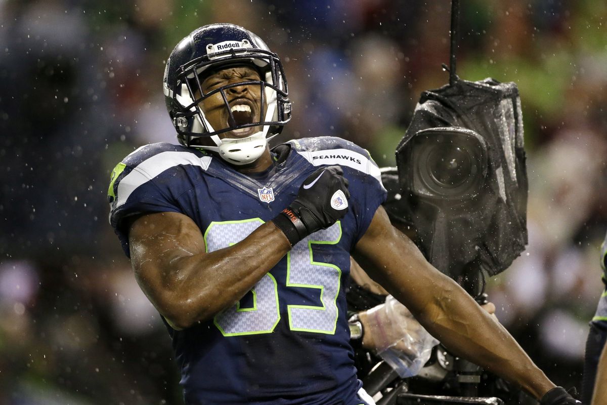Seahawks’ Anthony McCoy is all fired up after catching a 6-yard touchdown pass late in the second quarter of a victory over the 49ers on Sunday in Seattle. (Associated Press)