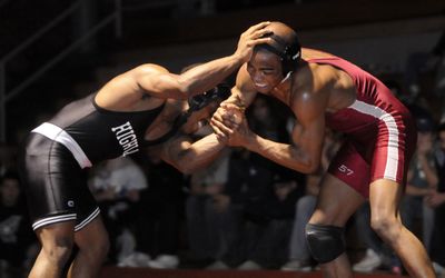 NIC’s Lester Brown, right, avenged two earlier losses to Highline’s Aaron Smith to capture the 133-pound championship. (Jesse Tinsley / The Spokesman-Review)