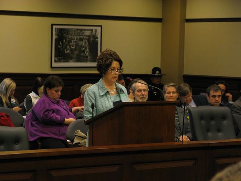 Karen Echeverria, executive director of the Idaho School Boards Association, speaks against SB 1184, the school reform bill, on Tuesday. The group can't support mandated cuts in salary funds for the next five years, she said; that's how the bill pays for technology investments and a teacher merit-pay bonus program. (Betsy Russell)