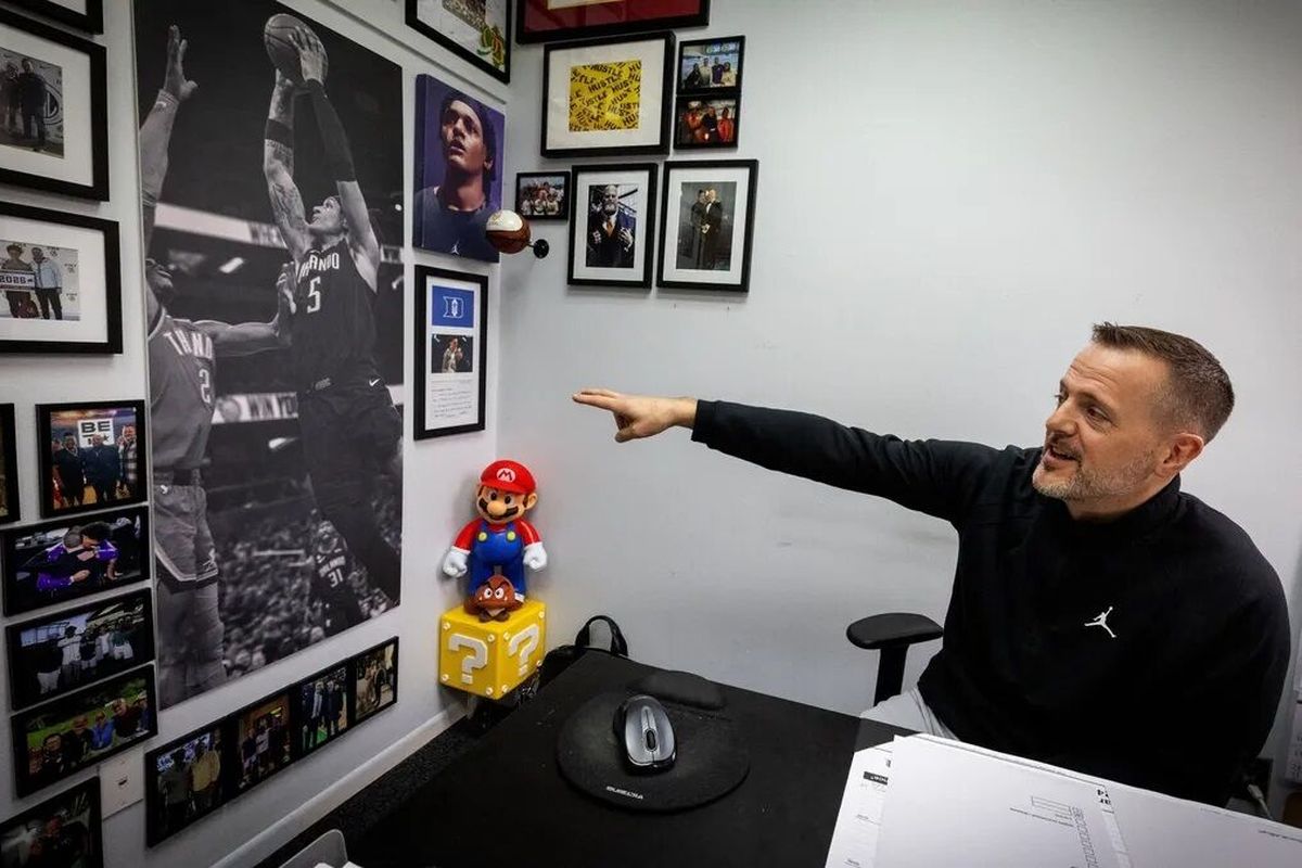 Mario Banchero’s office, in his family’s 90-year-old butcher and meat distribution company Mondo & Sons, showcases his older son, NBA star Paolo Banchero.  (Ken Lambert/Seattle Times)