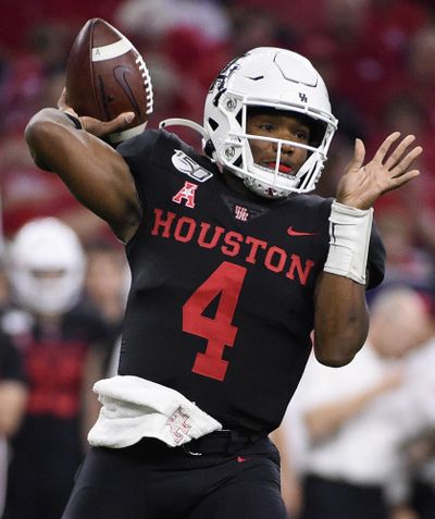 Houston quarterback D’Eriq King throws a pass during the first half of the team’s NCAA college football game against Washington State, Friday, Sept. 13, 2019, in Houston. (Eric Christian Smith / Associated Press)