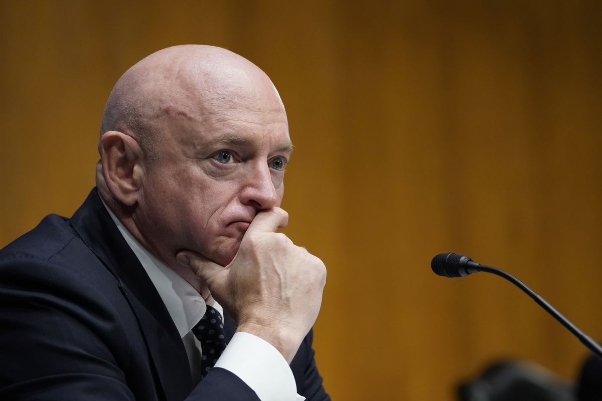 Sen. Mark Kelly, D-Ariz., listens during a Senate Energy and Natural Resources Committee hearing on Capitol Hill in Washington, Thursday, March 11, 2021, to examine the reliability, resiliency, and affordability of electric service in the United States amid the changing energy mix and extreme weather events.  (Susan Walsh)