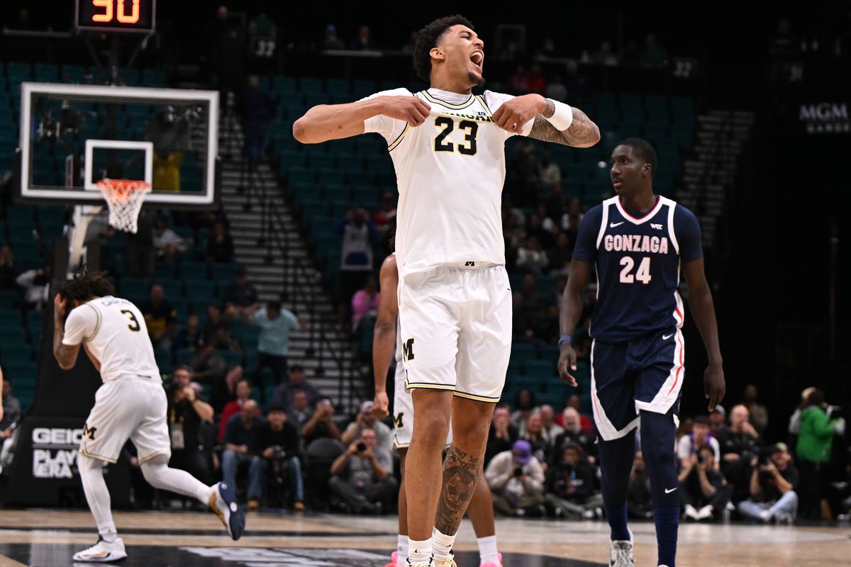Michigan Wolverines forward Yaxel Lendeborg (23) celebrates after dunking the ball against the Gonzaga Bulldogs during the second half of a college basketball game on Wednesday, Nov 26, 2025, at MGM Grand Garden Arena in Las Vegas, Nev. The Wolverines won the game 101-61.  (Tyler Tjomsland/The Spokesman-Review)