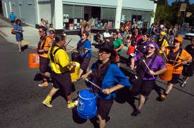 
The Rhythm Envy Bucket Band makes its way south on Perry Street last year as part of the annual parade in the South Perry Street neighborhood. Spokesman-Review file photo
 (Spokesman-Review file photo / The Spokesman-Review)