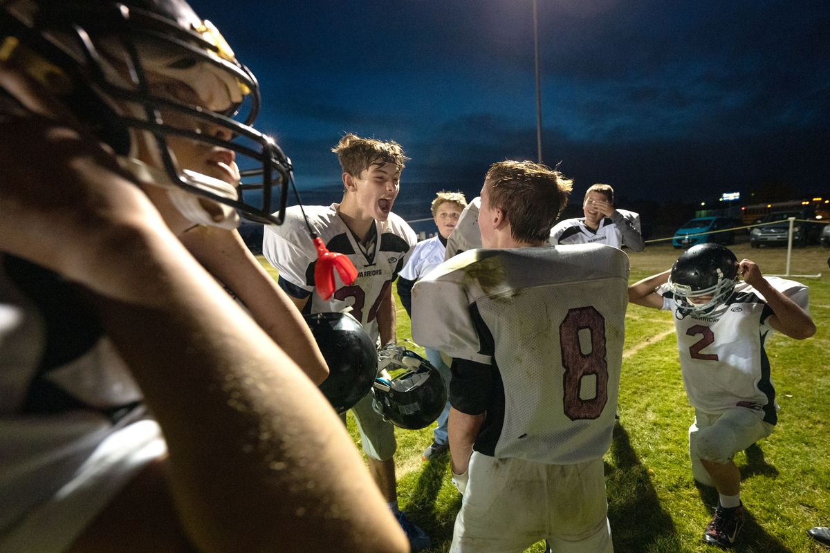 The Almira/Coulee-Hartline Middle School team celebrate its 61-18 win over the Wilbur Wildcats on Thursday in Wilbur, Wash. It was the Warriors’ first game since losing their school to a fire on Tuesday evening.  (Colin Mulvany/THE SPOKESMAN-REVIEW)