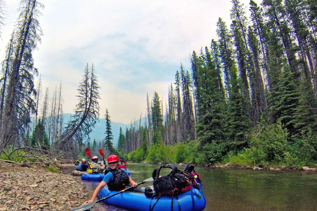 Jared White paddles his packraft through a rapid on the South Fork Flathead River in Montana.