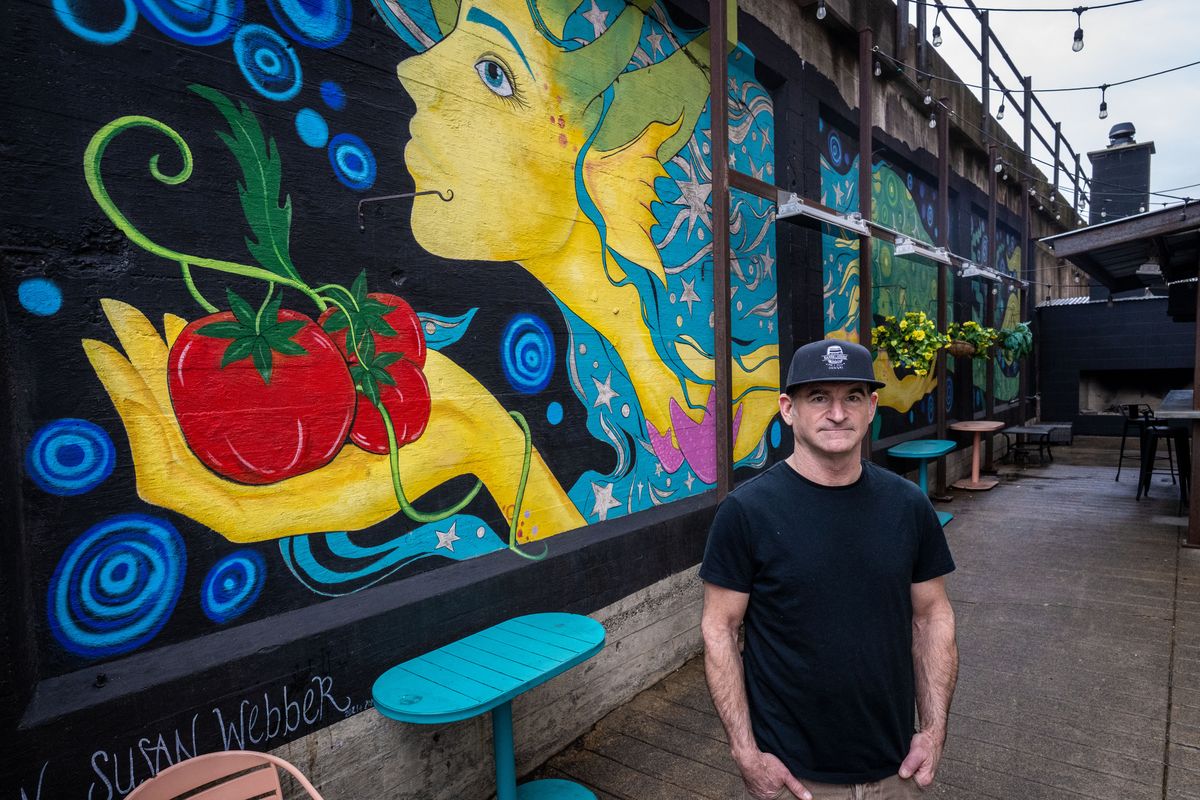 Matt Lazarus (with co-owner Jennifer Hansen) wanted to bring a more elevated approach to downtown Spokane when expanding from their first location in Cheney with Barrelhouse Pizzeria.  (COLIN MULVANY/THE SPOKESMAN-REVI)
