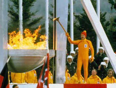 
On this date a quarter century ago, Dr. Charles Morgan Kerr, acting as torch bearer, lit the Olympic flame during opening ceremonies for the 1980 Winter Olympic Games at Lake Placid, N.Y. 
 (Associated Press / The Spokesman-Review)
