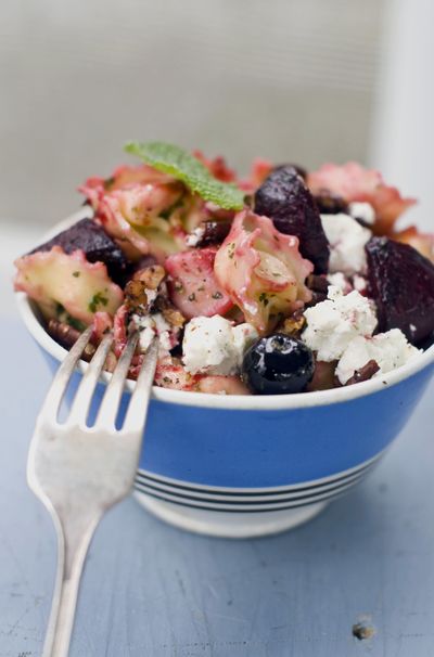 Roasted beet tortellini salad with fresh blueberries and soft goat cheese.