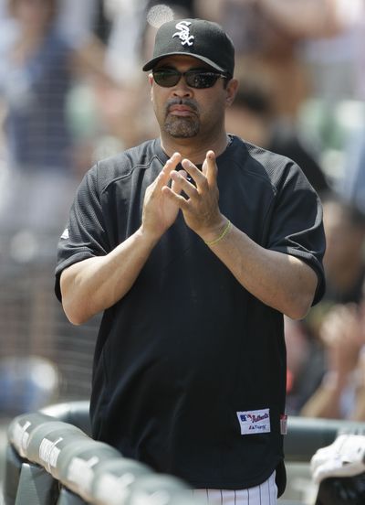 Chicago White Sox manager Ozzie Guillen expressed his frustration with fans after a 14-inning loss to Toronto. (Associated Press)