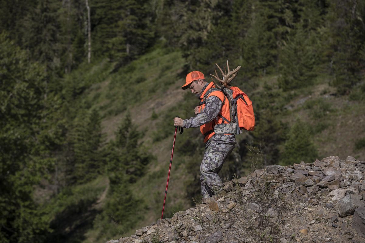 Even Washington modern rifle hunters who must wear fluorescent orange can benefit from camouflage clothing, such as SIXSITE