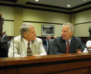 Rep. Phil Hart, right, talks with his attorney, Starr Kelso, left, at the House Ethics Committee hearing. (Betsy Russell)
