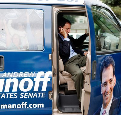 Democratic U.S. Senate candidate Andrew Romanoff talks on his phone as he arrives for a campaign stop in Denver on Thursday.  (Associated Press)