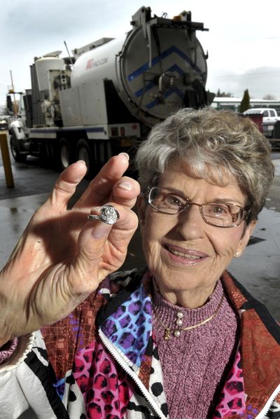 Pat Hanson poses with her recovered ring last week in Medford, Ore. (Associated Press)