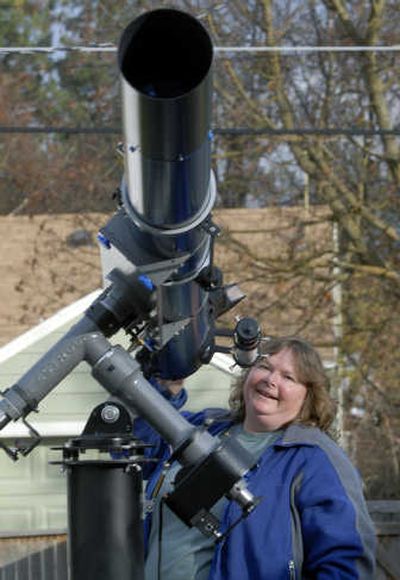 
Debbie Cotten is a member of the Spokane Astronomical Society. One of her telescopes is a 6-inch F 15 Cave Astrola which she has used to see the Andromeda Galaxy 2.9 million light years away.  
 (Dan Pelle / The Spokesman-Review)
