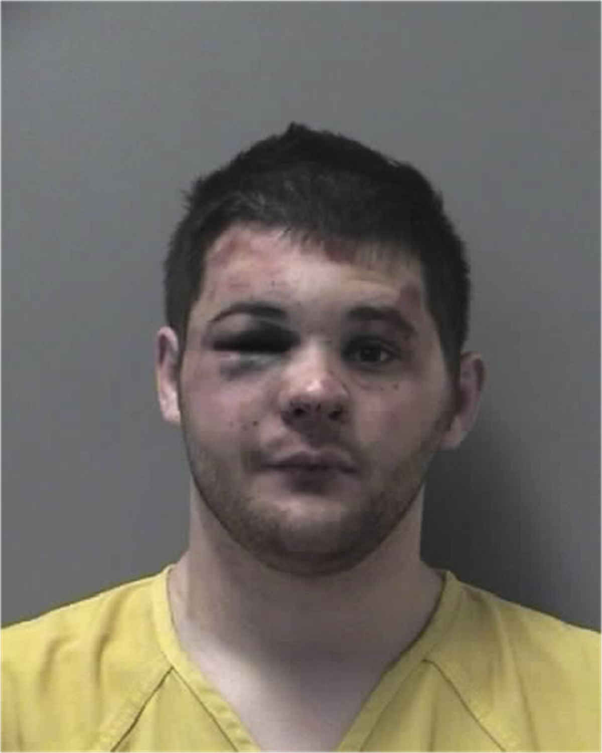 Adam M. Johnson, 25, was arrested early Sunday, accused of a shooting in downtown Coeur d