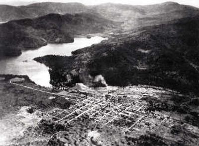 
This  photo of the Spirit Lake area was taken in the early 1930s. At the extreme left, the original bridge over the railroad grade is still being used. At mid-right, the Milwaukee Railroad Shops (closed in 1926) are still in place. The village of Spirit Lake is in the center foreground with the Panhandle Lumber Company mill and lumberyard beyond the town.  Photo courtesy of the Spirit Lake Historical Society.
 (Photo courtesy of the Spirit Lake Historical Society. / The Spokesman-Review)