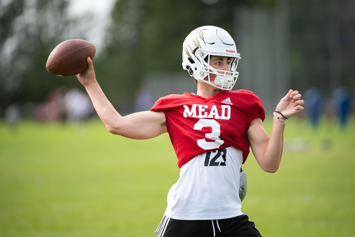 Mead High School quarterback Ryan Blair (3) fires off a pass during a Panther practice at Mead High School on Sept. 3, 2019. (Libby Kamrowski / The Spokesman-Review)