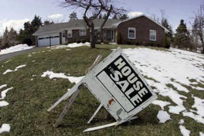 
A house sits unsold in Clarence, N.Y., on Monday. An uptick in home sales in February surprised many economists, who were expecting a continuation of six months of declining sales.  Associated Press
 (Associated Press / The Spokesman-Review)