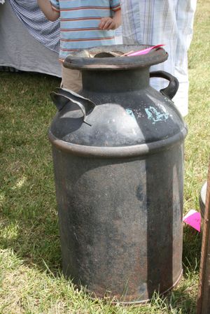 Instead of buying new products, consider giving old ones a new purpose. This old milk churn, for example, can be painted or left as is and then used in a foyer to hold umbrellas.  (Megan Cooley / The Spokesman-Review)