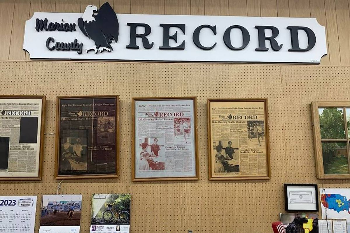 Front pages hang on a wall at the Marion County Record, where police served a search warrant Friday.    (Luke Nozicka/Kansas City Star/TNS)