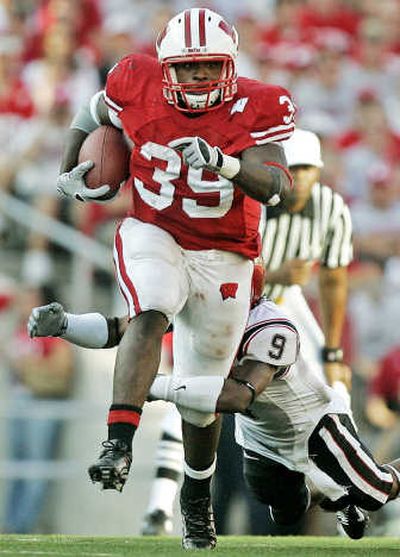 
Wisconsin tailback P.J. Hill will be a load for the Cougars to haul down. Associated Press
 (Associated Press / The Spokesman-Review)