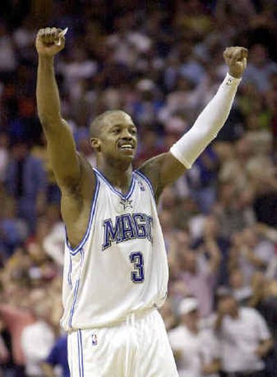 
Orlando's Steve Francis celebrates after scoring late in the fourth quarter en route to 32-point effort. 
 (Associated Press / The Spokesman-Review)