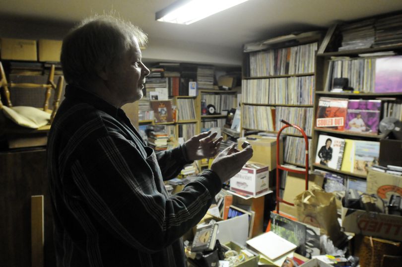 Roger Butler stands in the basement of his home Wednesday, Apr. 29, 2009.  He is being evicted from his modest South Hill home and is wondering how he will store his massive record collection estimated at more than 100,000 albums, mostly vinyl, but including CDs, posters and other collectibles.    JESSE TINSLEY THE SPOKESMAN-REVIEW (Jesse Tinsley / The Spokesman-Review)