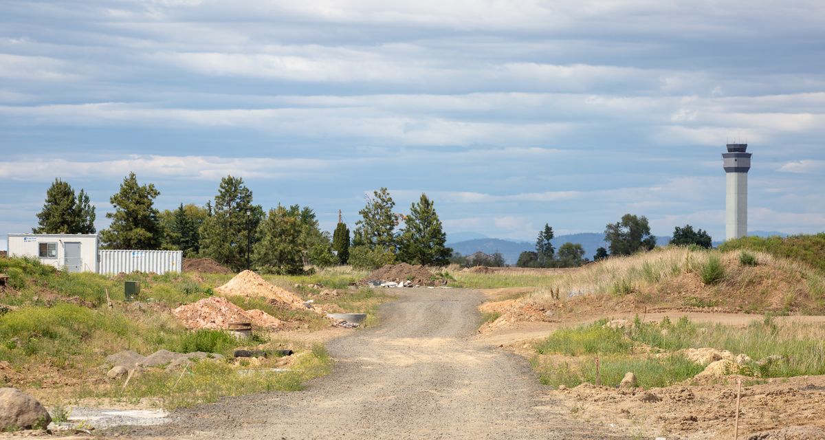 Land that will soon be occupied by homes is seen behind the recently-constructed Country View Meadows neighborhood on the West Plains on Tuesday, June 8, 2021. Construction company D. R. Horton said that construction has already begun on the next phase of the development.  (LIBBY KAMROWSKI/THE SPOKESMAN-REVIEW)