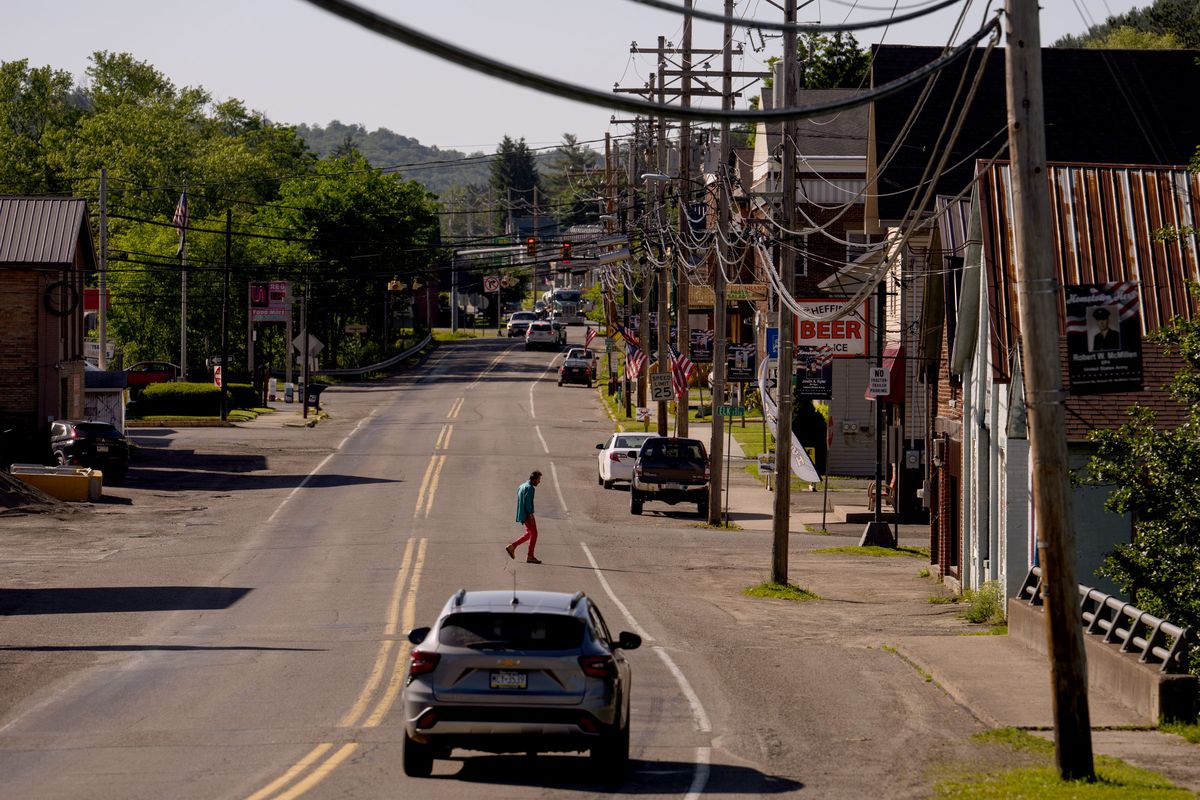 Cars are seen on Main Street in Sheffield, Pa., on May 31. Sheffield is much like many rural Pennsylvania towns, where deaths have outpaced births. MUST CREDIT: Justin Merriman for The Washington Post  (Justin Merriman/For The Washington Post)
