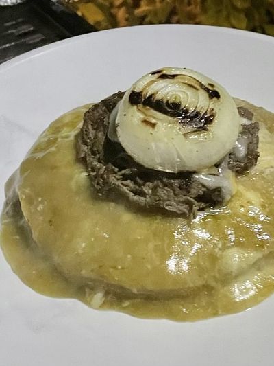 This mashup combines two classics: enchiladas with a cheese burger on top! (Leslie Kelly)