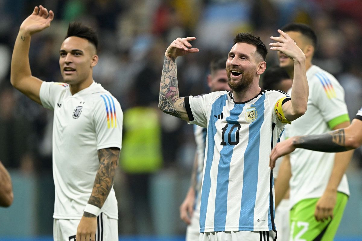 Argentina forward Lionel Messi celebrates after defeating Croatia 3-0 in the World Cup semifinals in Lusail, Qatar, north of Doha, on Dec. 13.  (Tribune News Service)