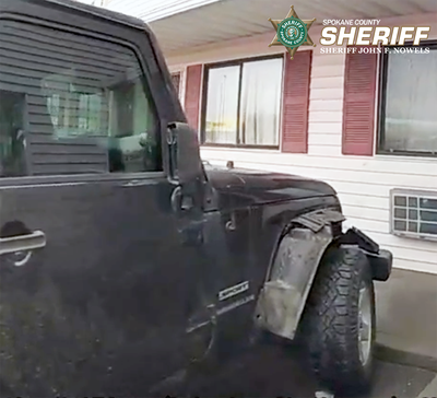 This black Jeep Wrangler was used in a felony hit-and-run crash Jan. 24 in the 5200 block of East Broadway Avenue that left a woman seriously injured, according to Spokane Valley police.   (Courtesy of Spokane County Sheriff's Office)